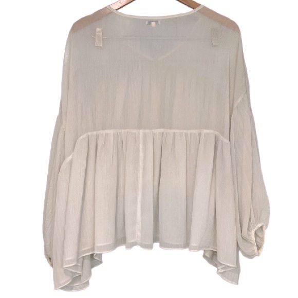 A. Peach boho sheer top. - Picture 5 of 9